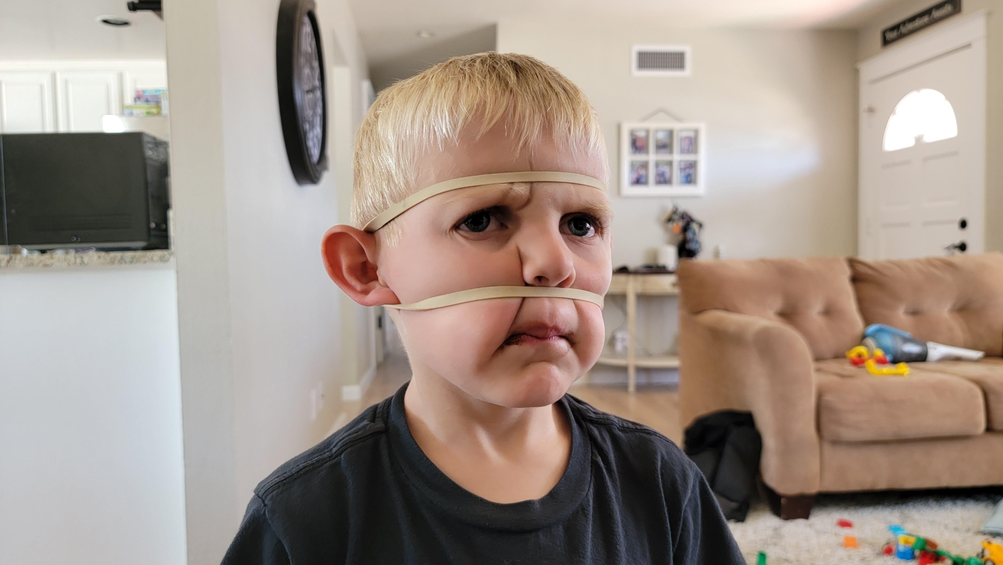 My 4 year old brought me a rubber band and asked me to do this to him.