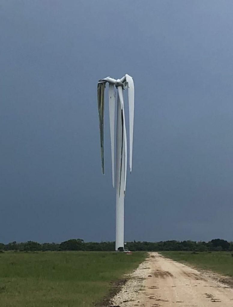 Lack of wind causing a wind turbine to wilt