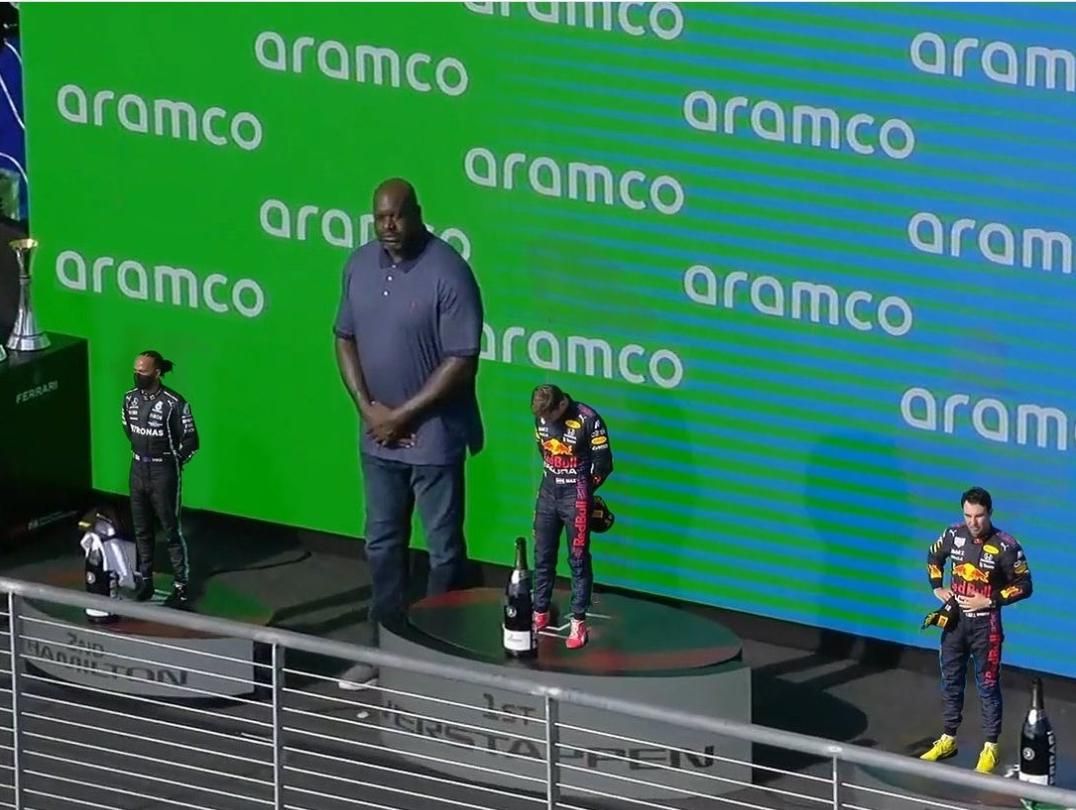 Shaquille O'Neil on the F1 podium.