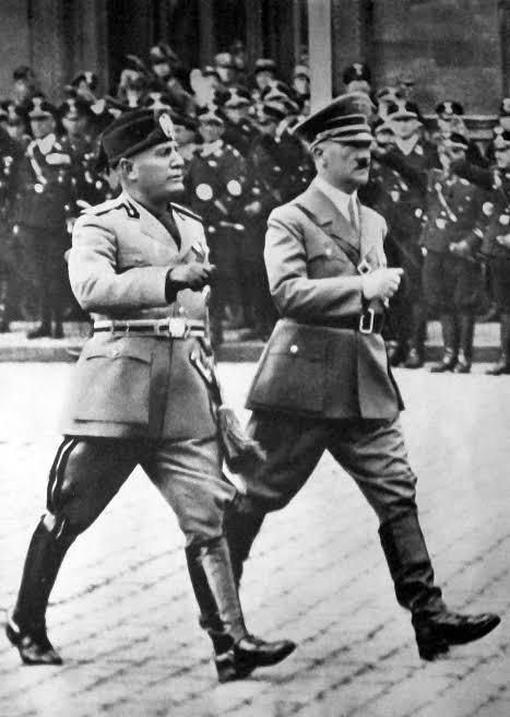 Benito Mussolini and Adolph Hitler togheter making a tiktok dance