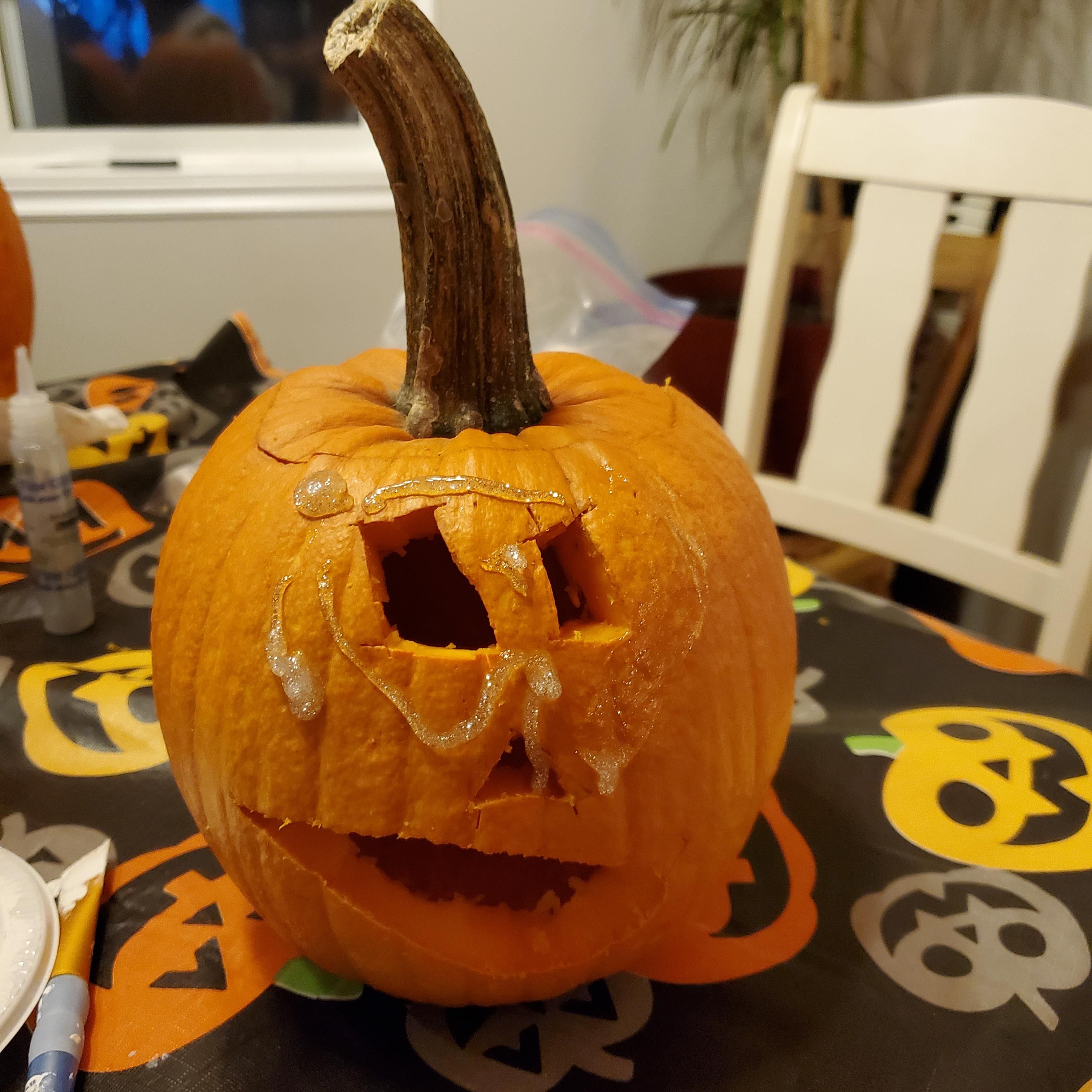 Our little neighbor friend made his first pumpkin. I managed to not laugh out loud at the added glitter.