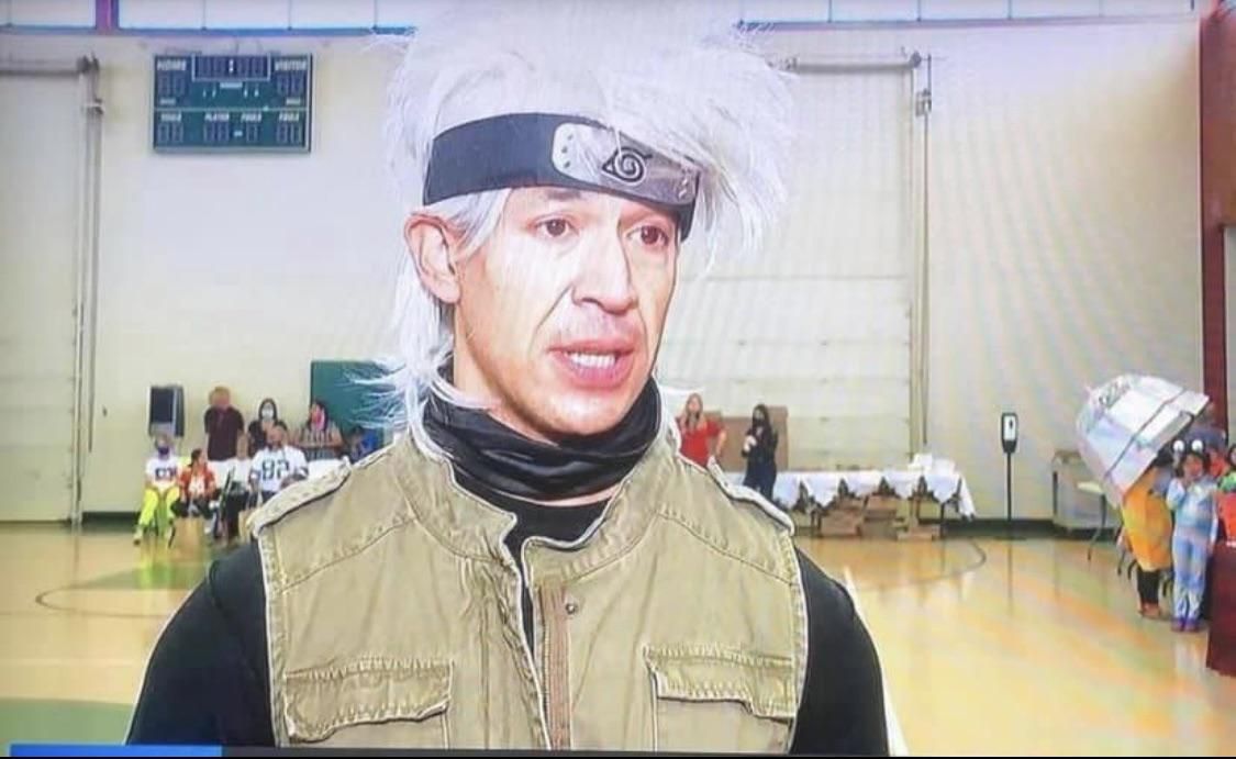 So here’s a picture of my mayor dressed up as Kakashi for Halloween
