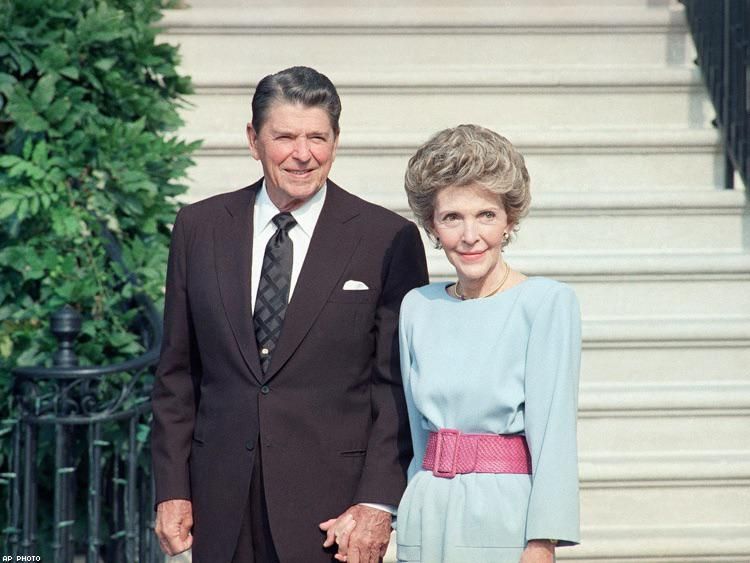 Ronald Reagan poses with the CEO of Burlington Throat Factory