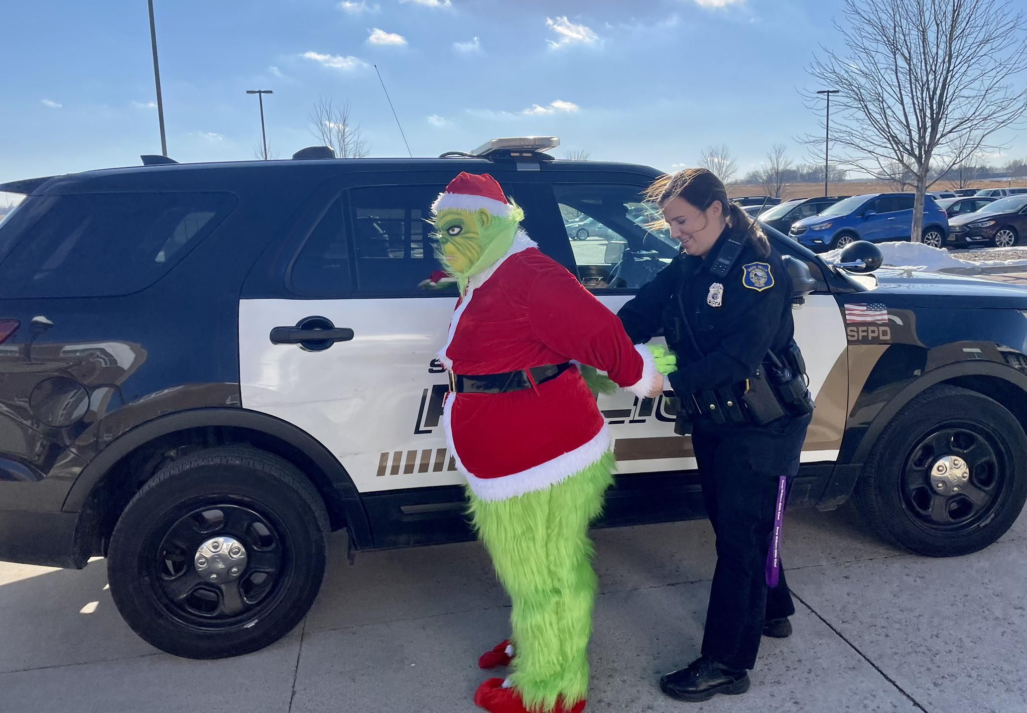 Sioux Falls police department arrests Mr. Grinch for attempting to steal holiday cheer.