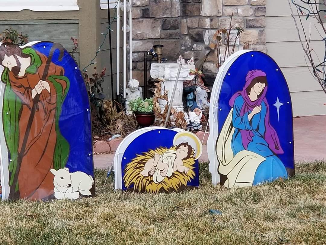 My neighbors put up their Christmas display incorrectly and it looks like Joseph and Mary are ashamed of Jesus.