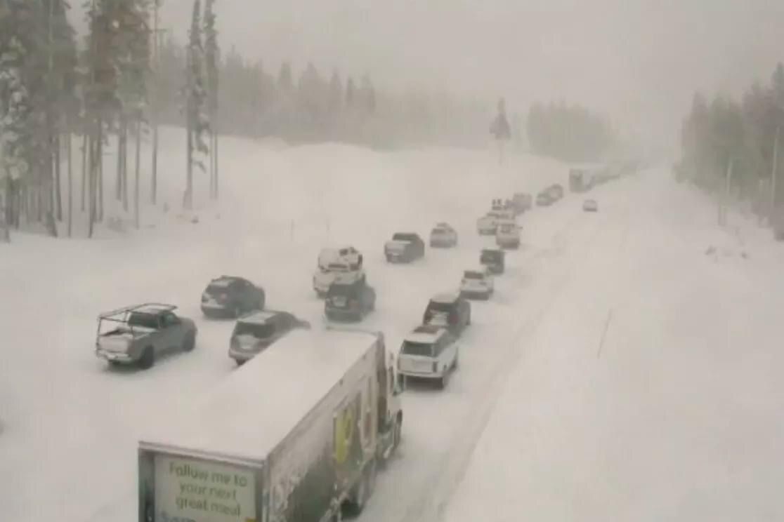 Legit photo of Donner pass from today. Look at what the back of the truck says.