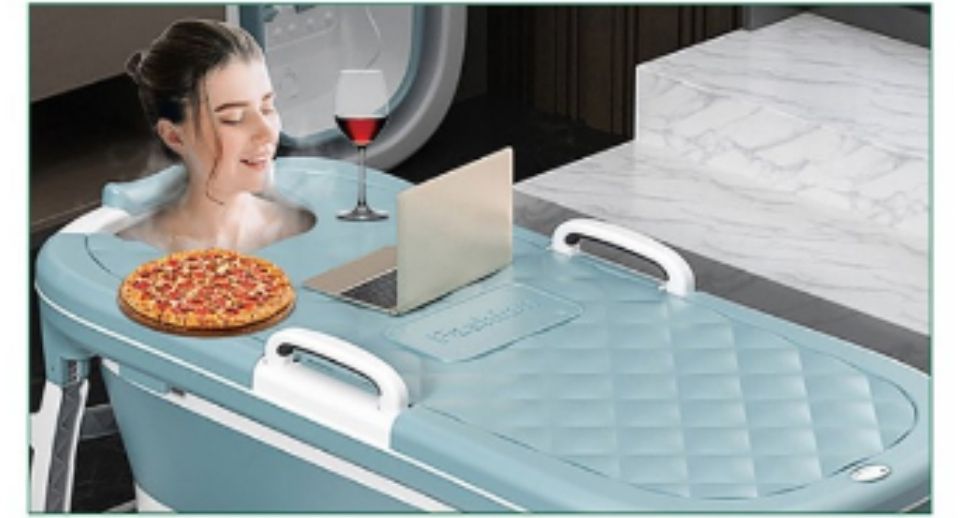 I don't know who creates these product images but yes, let's use a laptop, eat a whole pizza, and have a glass of wine all while being confined to a bath.