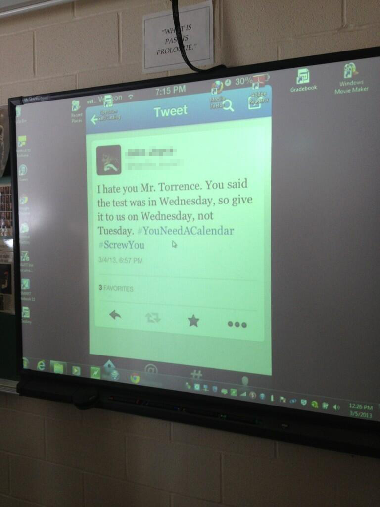 A kid in my class tweeted about a test we had. Here was our teacher's background today.