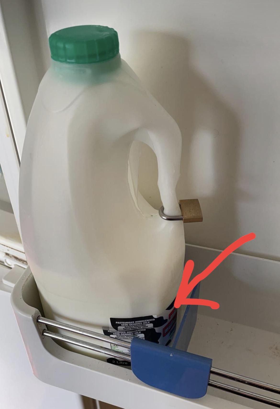 My flat mate has taken the security of the milk in next level. He cut one milk bottle into half and put on top of the new one and lock it so nobody can try to steal milk from him.