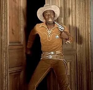 Actor Jussie Smolette is taken hostage by white supremacists while filming the movie "Blazing Saddles"