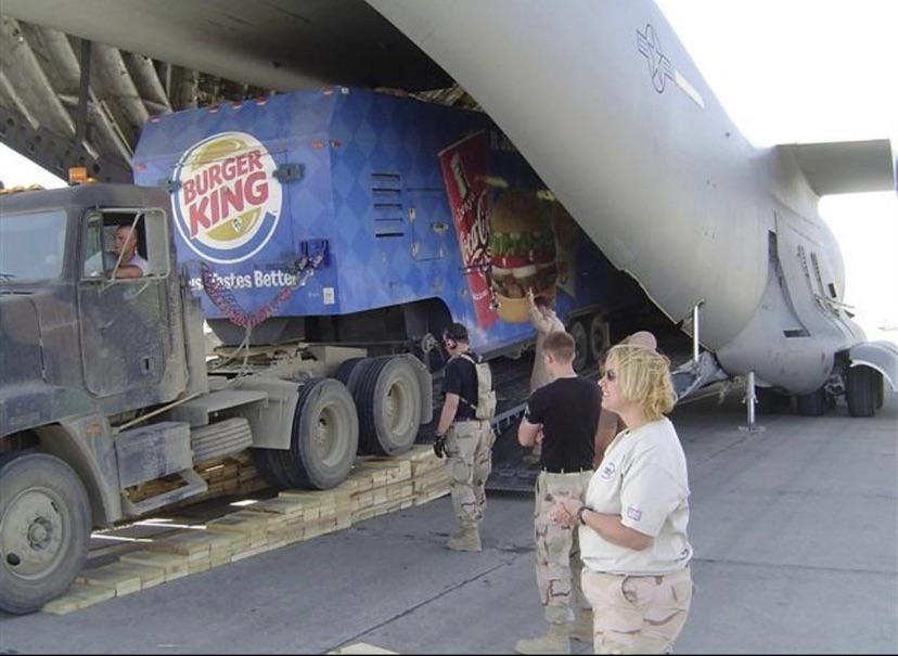 Mobile American Embassy offloading from military cargo jet, circa 2002