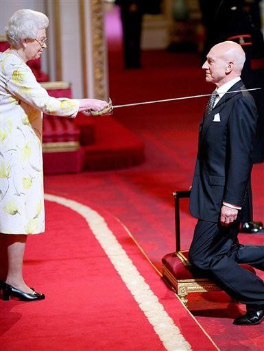 Patrick Stewart defiantly smirking at Queen Elizabeth, only moments before she beheads him