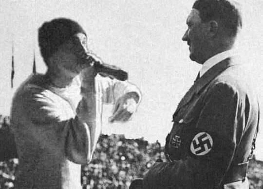 Eminem in an intense rap battle with Adolf Hitler . Hitler killed himself shortly after.