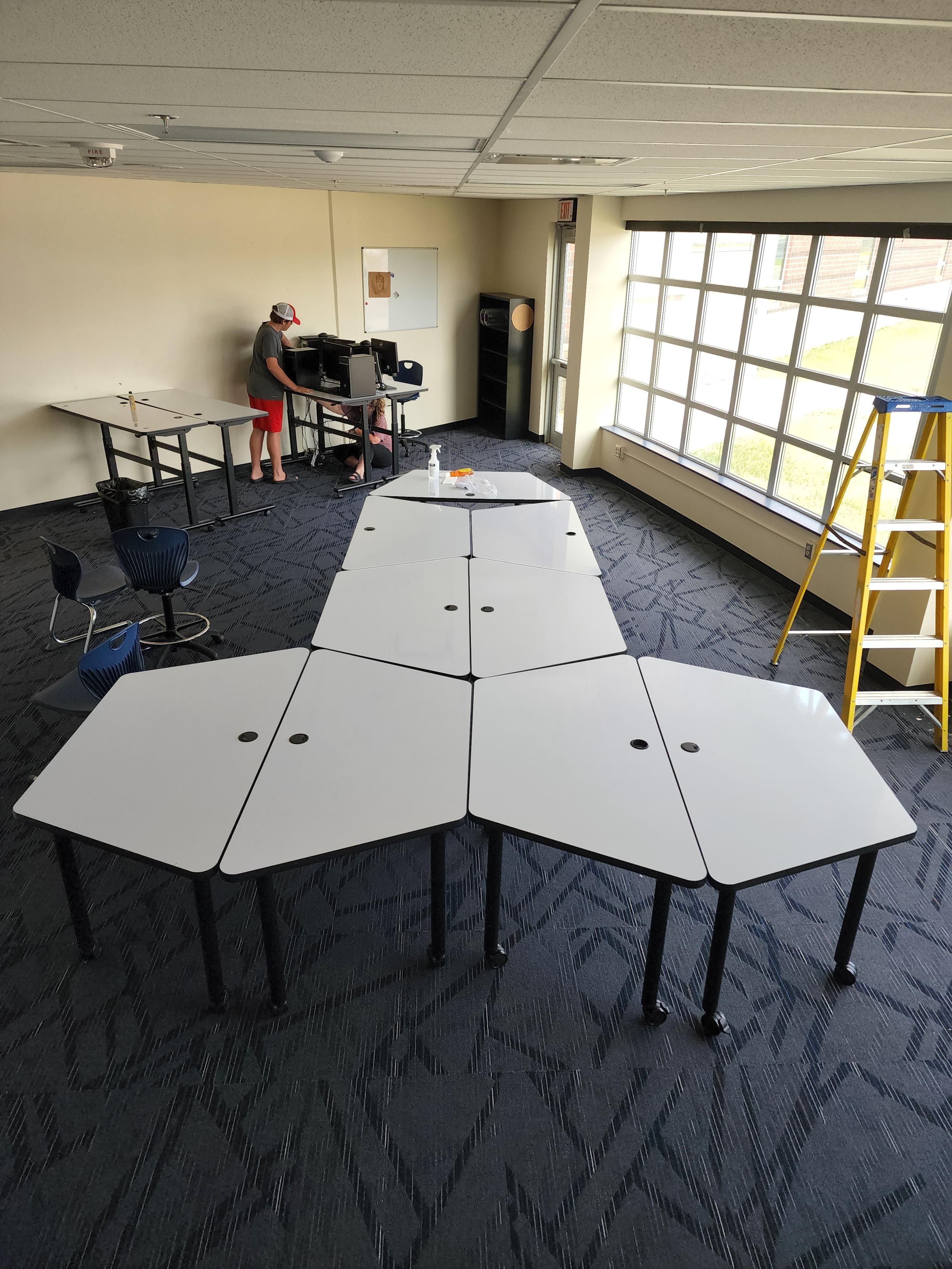 My wife asked our teenager to help set up tables in her classroom. Instant regrets