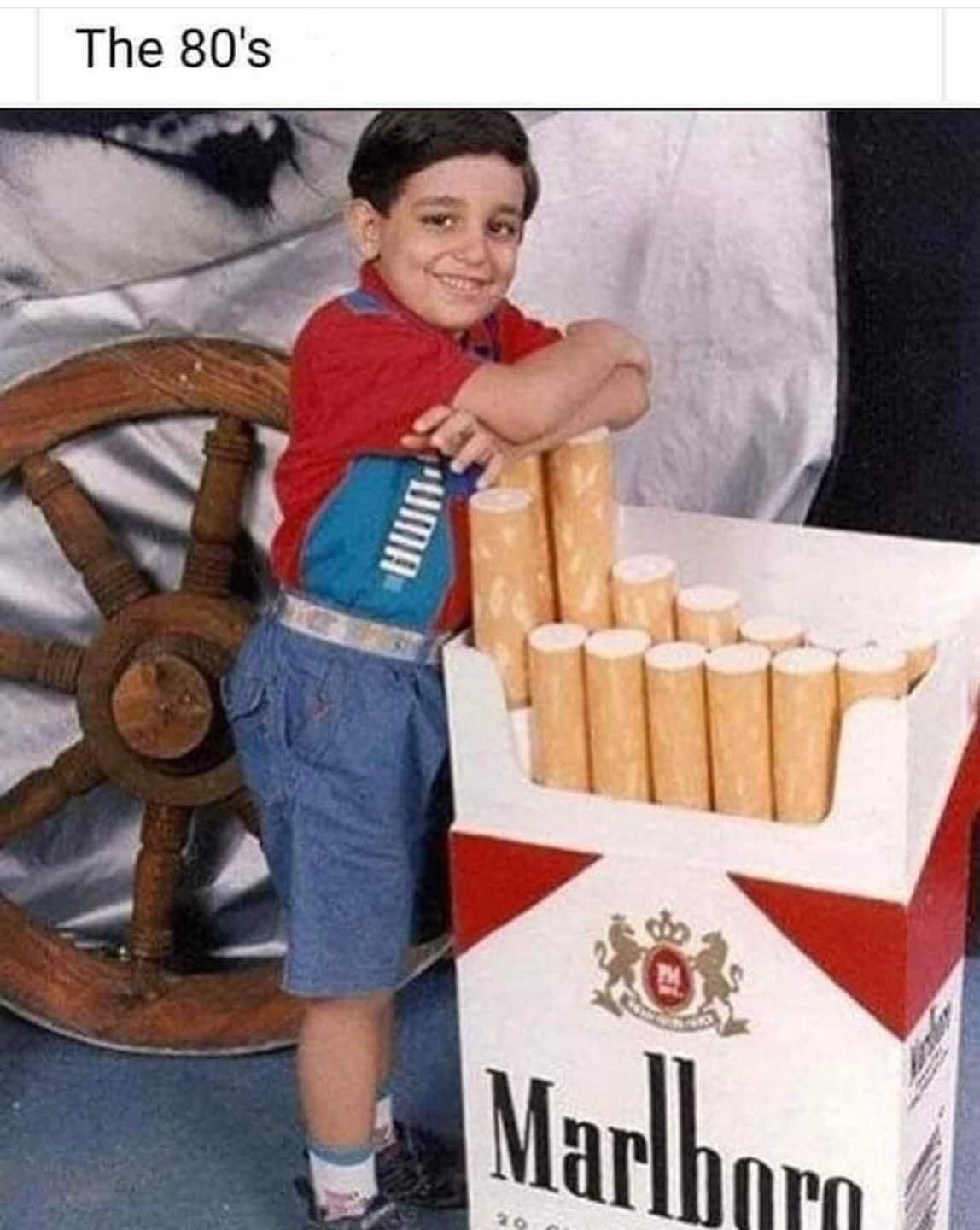Only in the 80’s would you hear a father say, “Hey son, let’s get a picture of you standing with that big pack of cigarettes.”