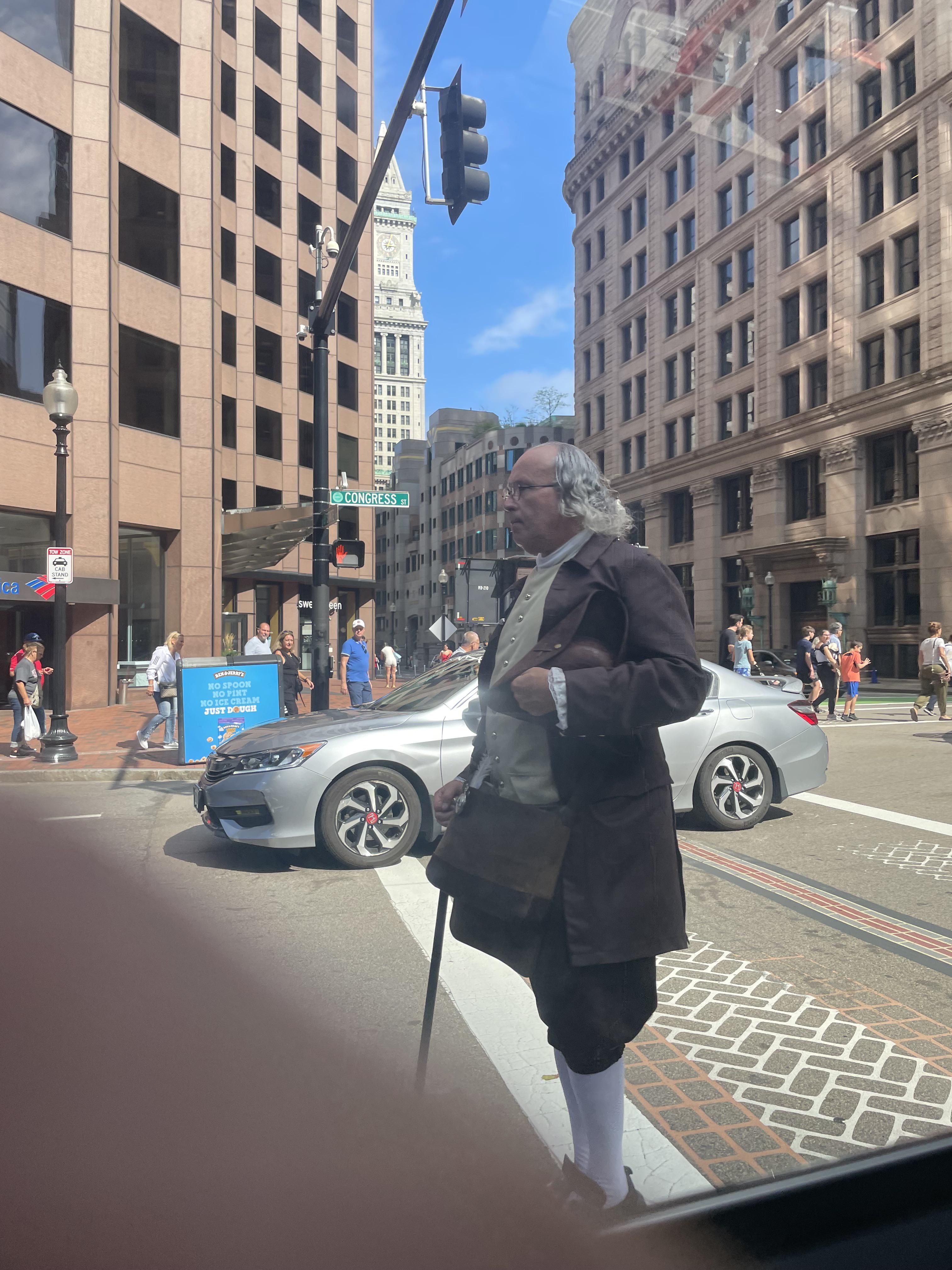 Just Ben Franklin crossing the road. Totally normal Boston day.