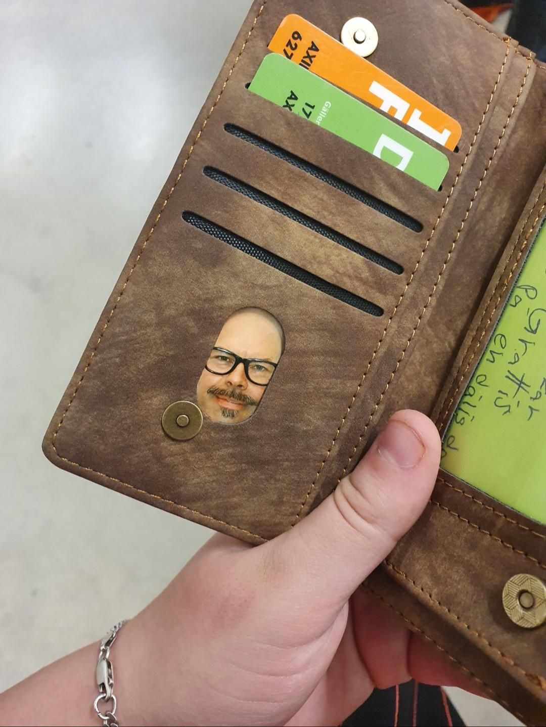 my mom had a pic of my dad in her wallet like this