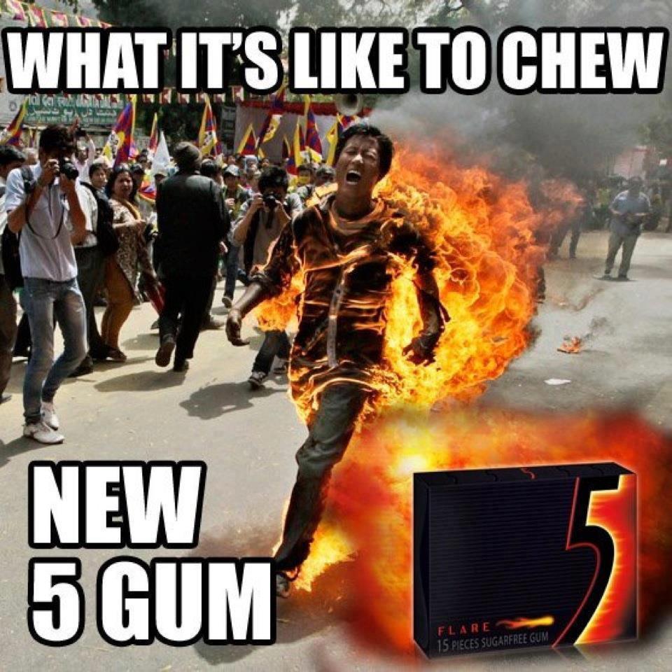 Hey! A guy's on fire! Let's take pictures of him!
