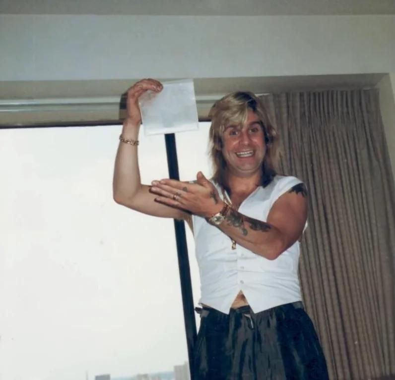 Ozzy Osbourne showing how much sugar he likes in his morning coffee. Circa 1984