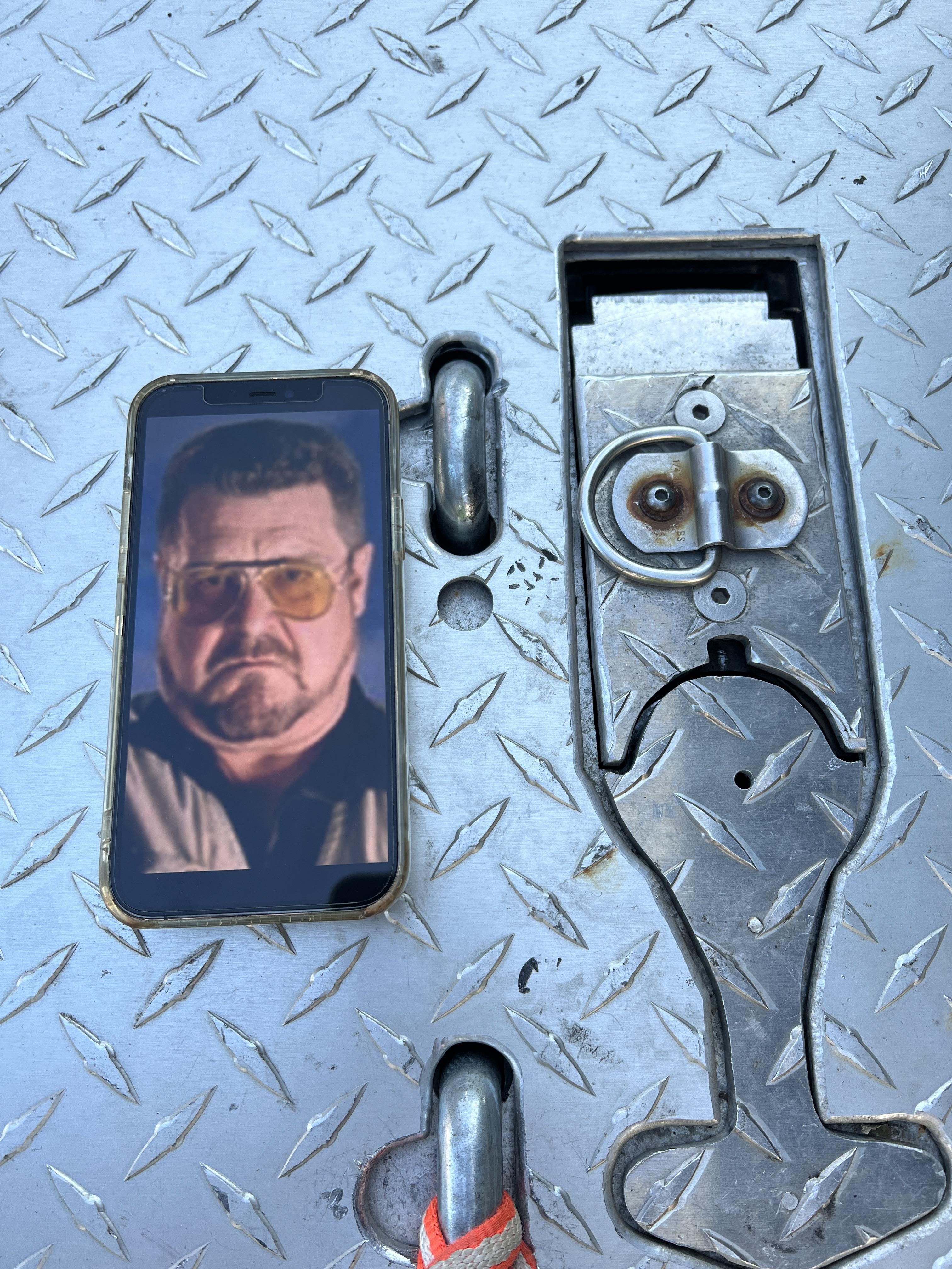 This is a tie down on a truck I was working on today. Amazing resemblance.
