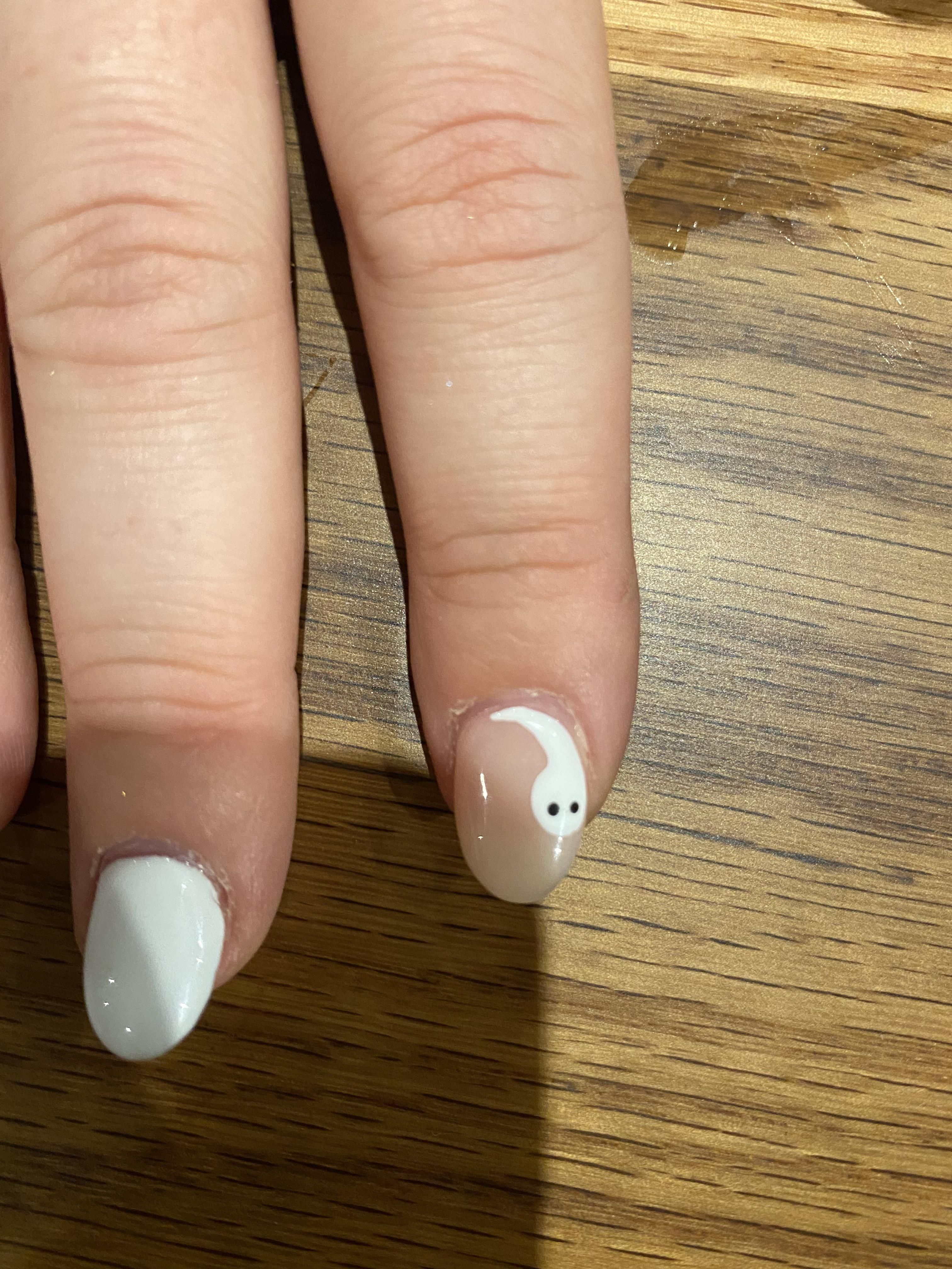 My friend wanted ghosts painted on her nails for Halloween. Unfortunately they look like sperm.