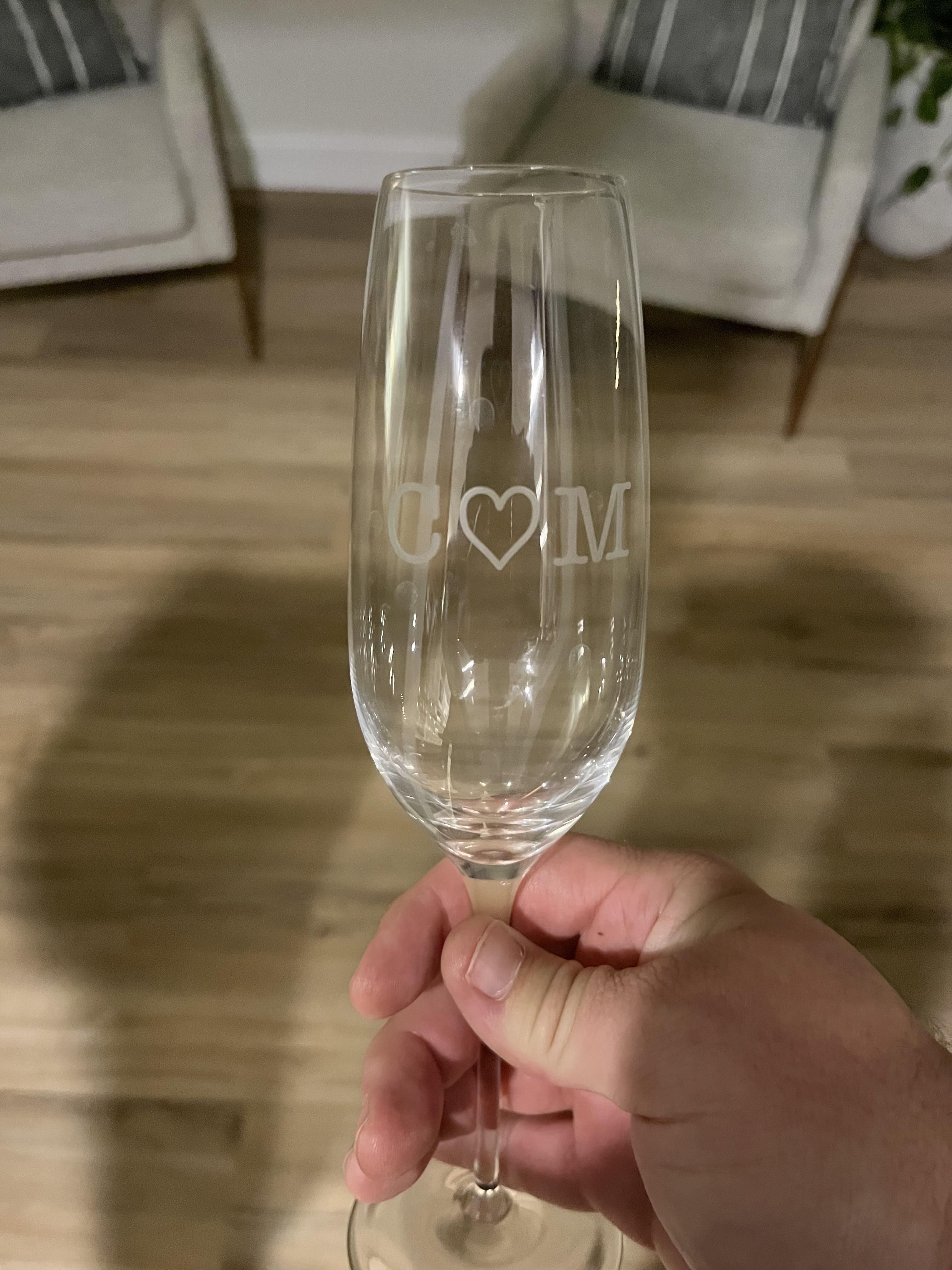 My mom gave me and my wife these wine glasses with our initials engraved.