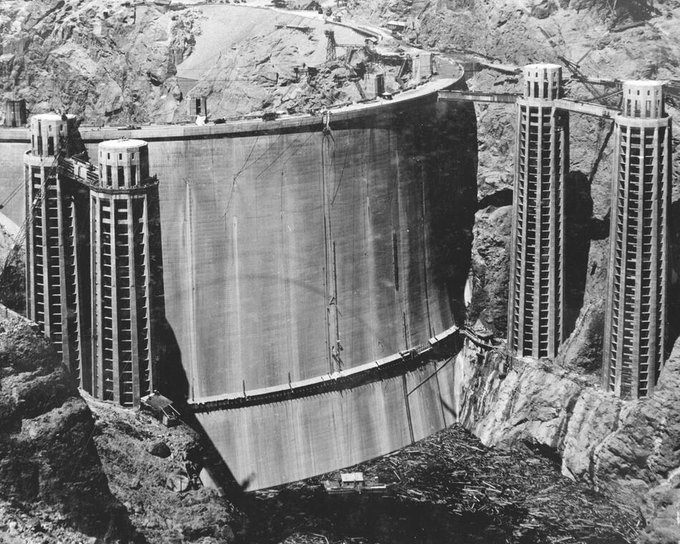 The rarely-seen back of the Hoover Dam before it was filled with pudding, 1936