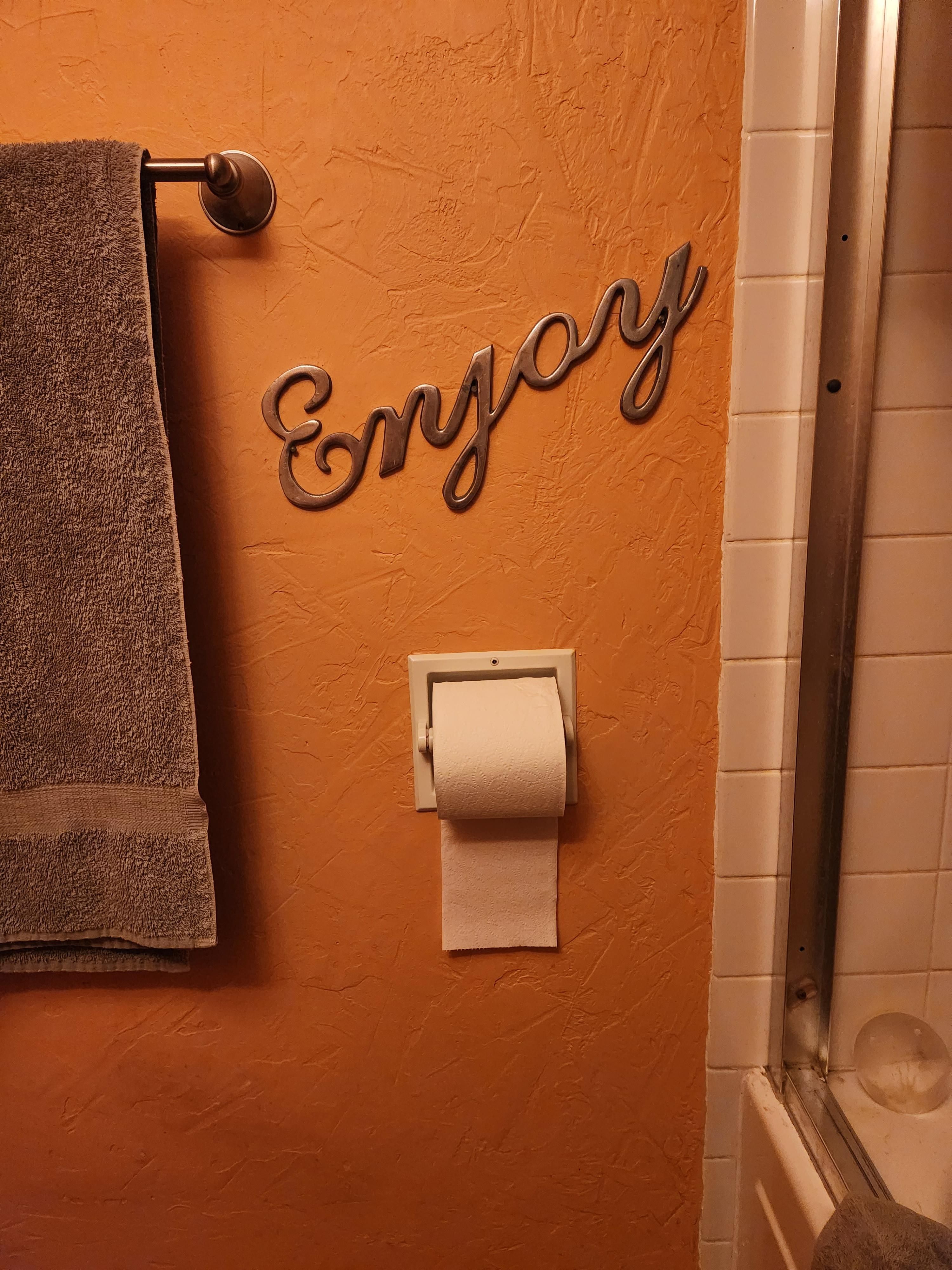 My wife went to the flea market and brought home a wall decoration for the bathroom