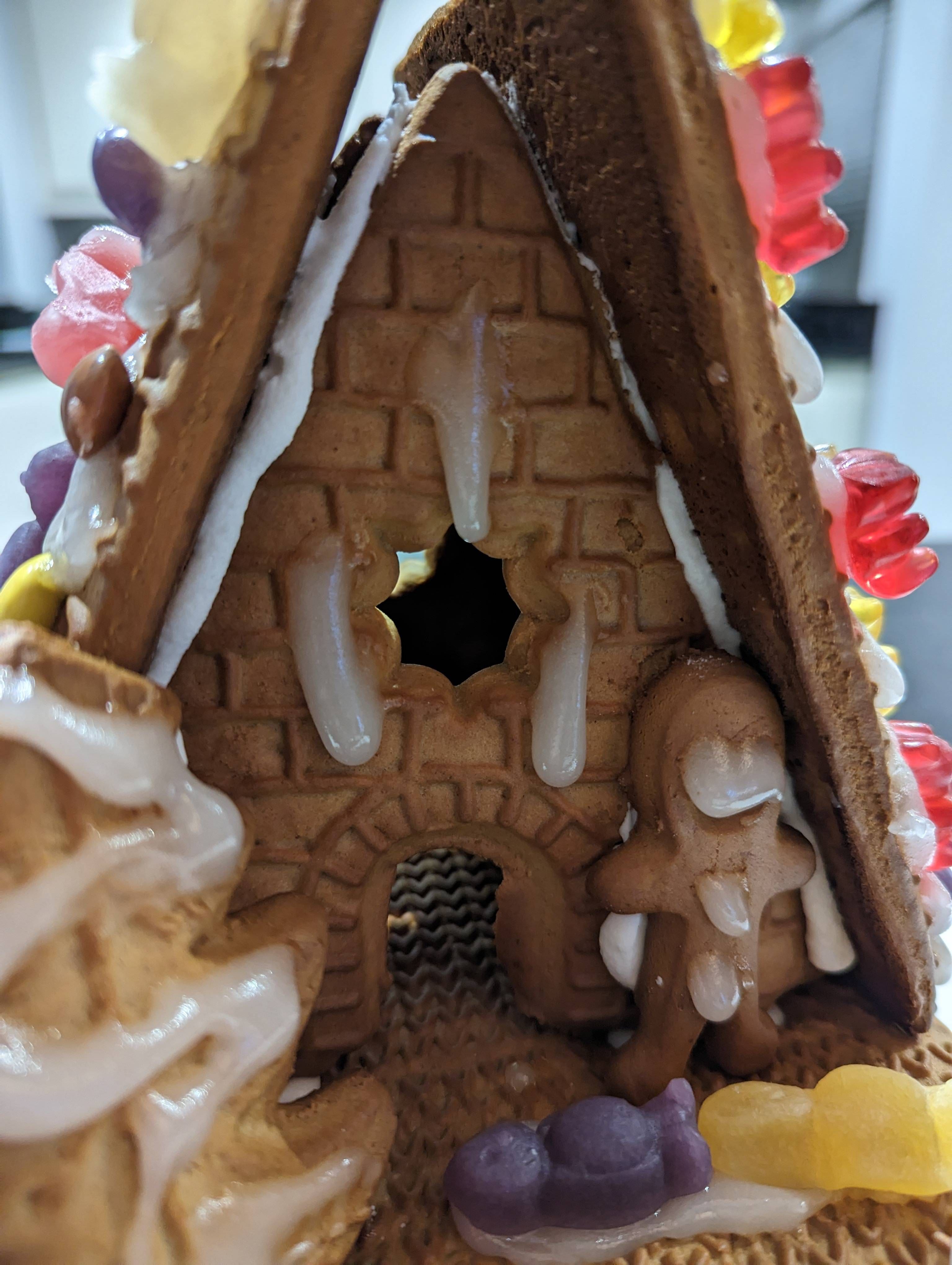 The same gingerbread house. A different child. Equally brilliant results.