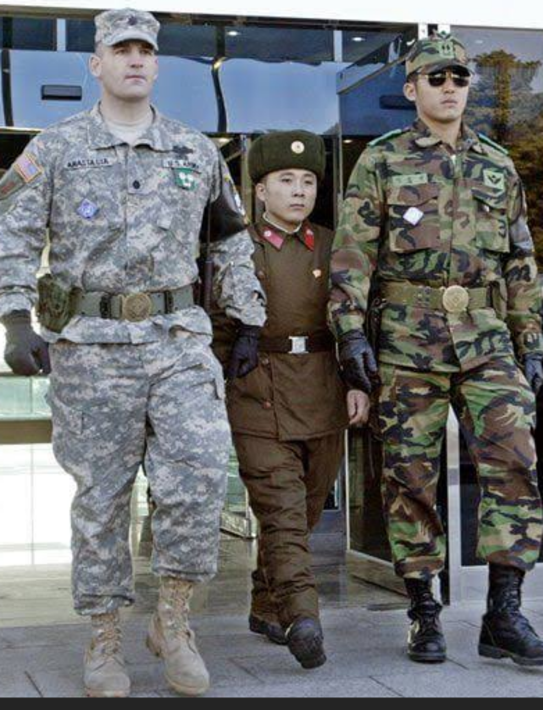 North Korea sending their smallest soldier to troll the trolls and hide their super tall super soacker soldiers for the great attack.