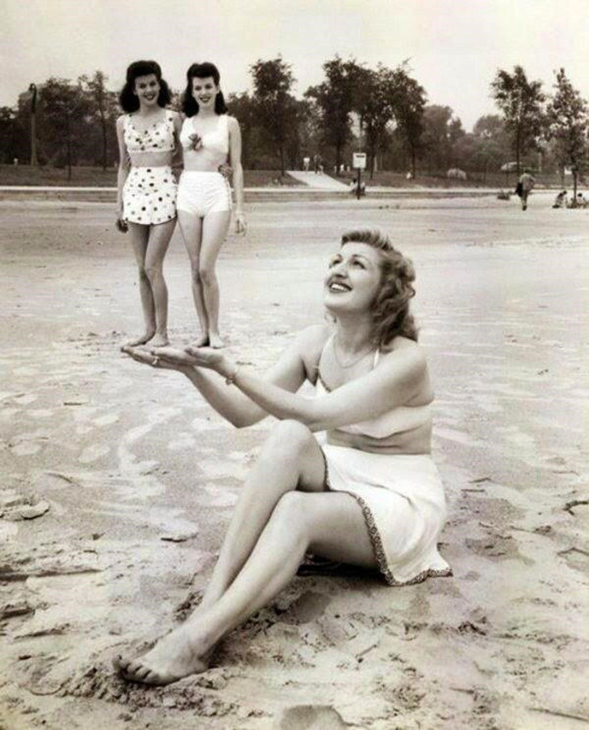 A woman on the beach discovers a race of tiny people, 1943