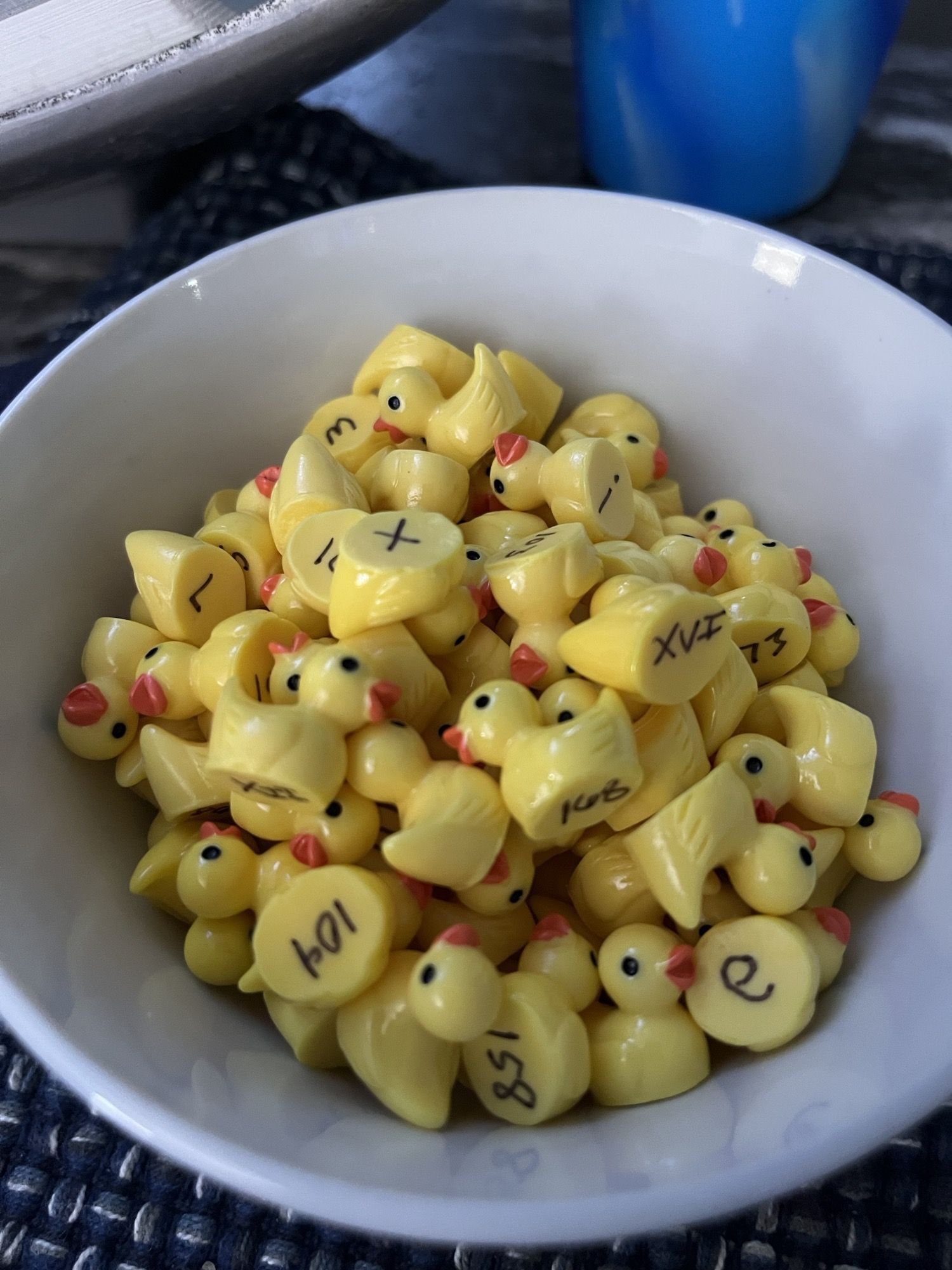 Number and lettering tiny ducks to hide in my friends homes.