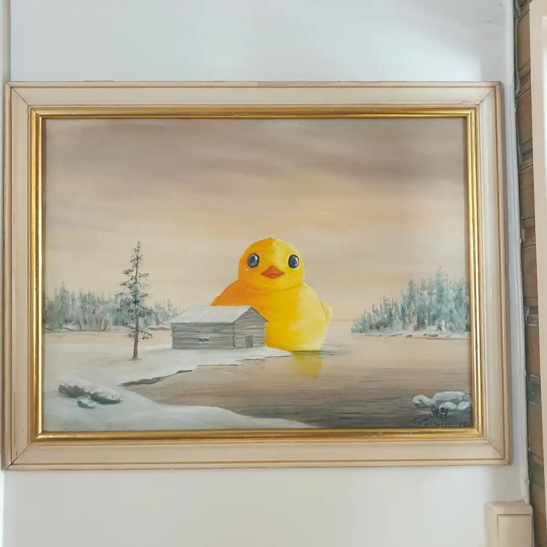 I painted a rubber duck onto this painting that was being thrown away.