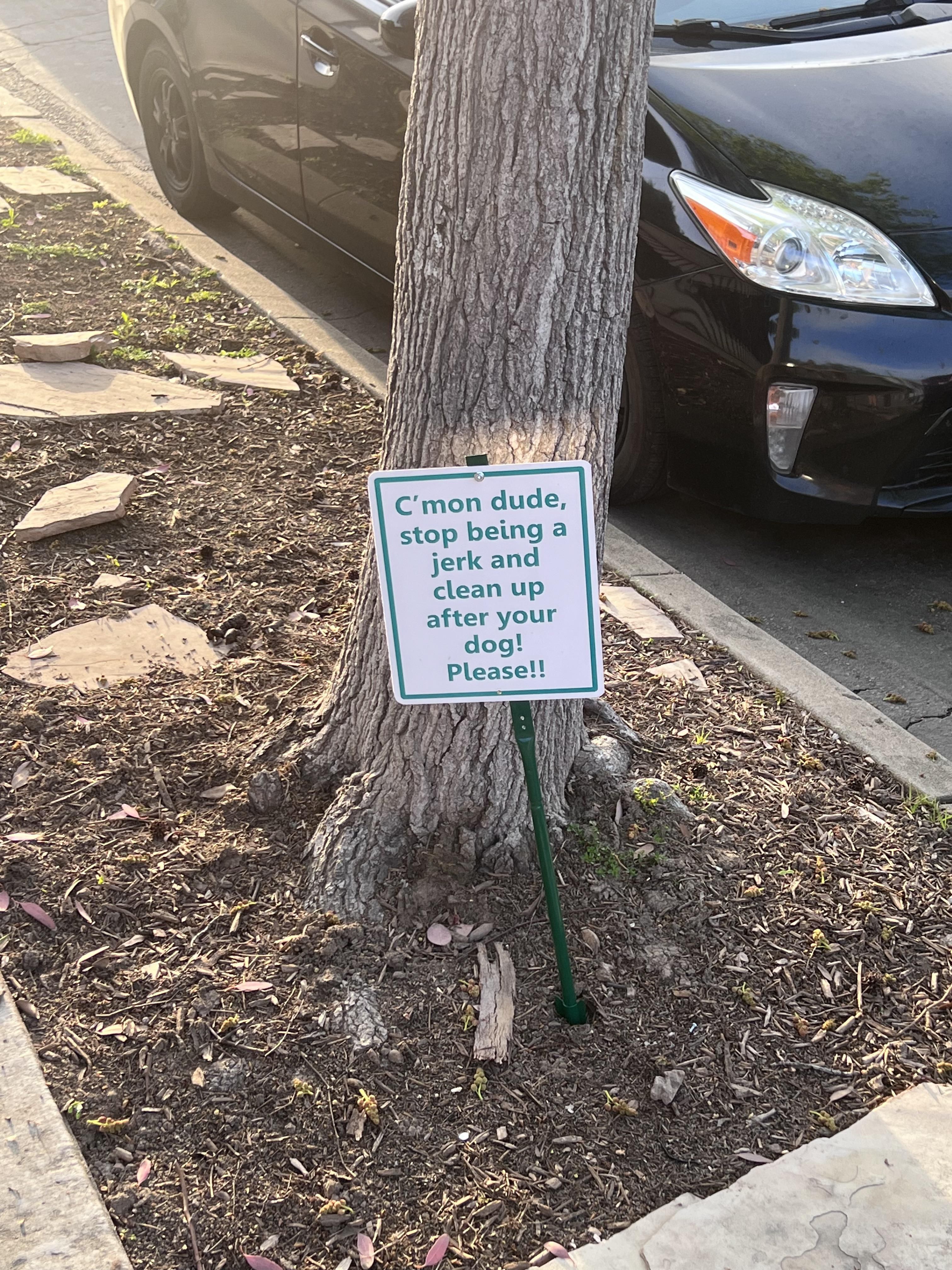 Another fed up neighbor. They went all out for the metal sign. But seriously, just pick it up.