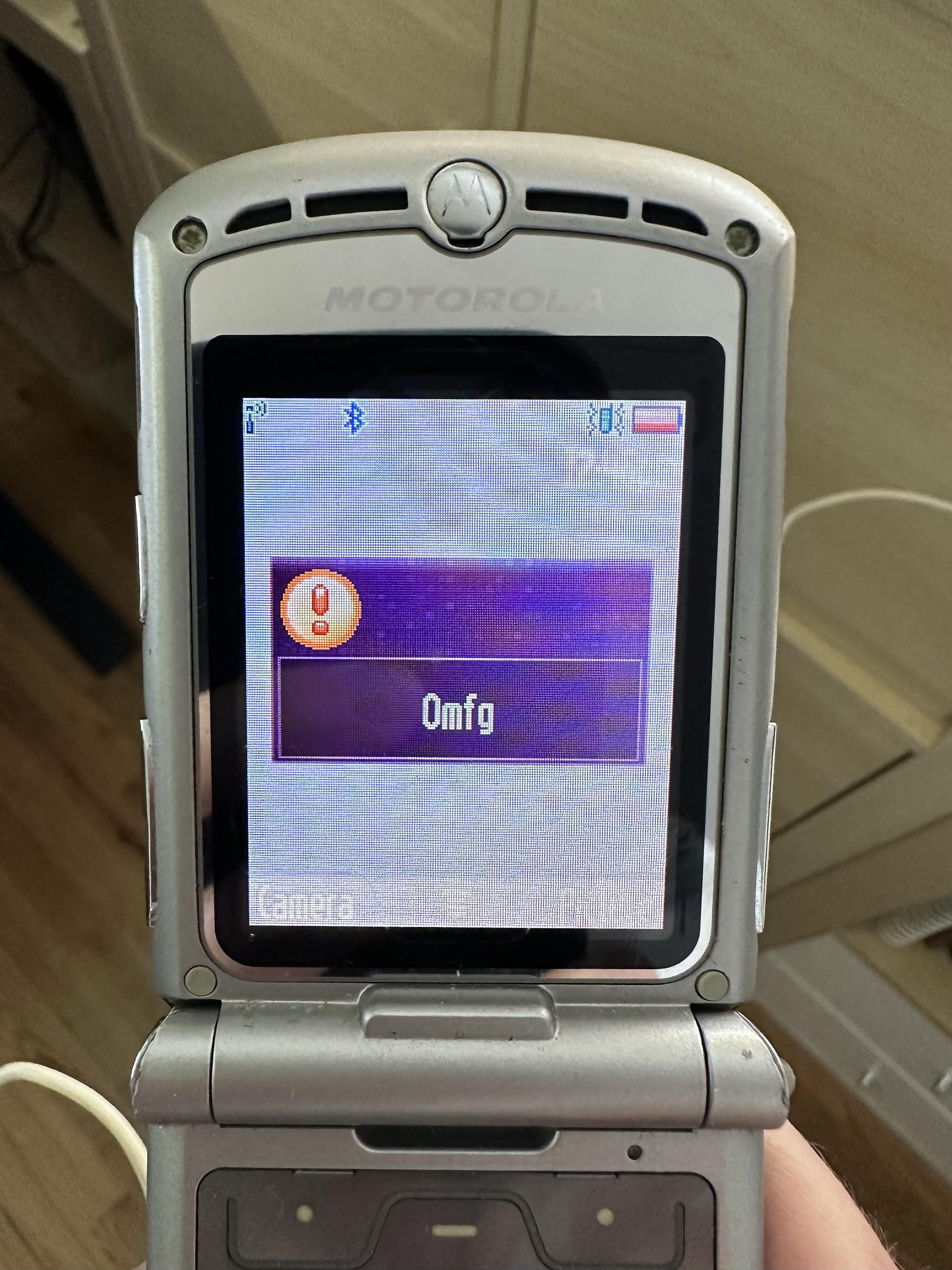 Turned on my old Razr and this is the error it gives me before spontaneously shutting down again.
