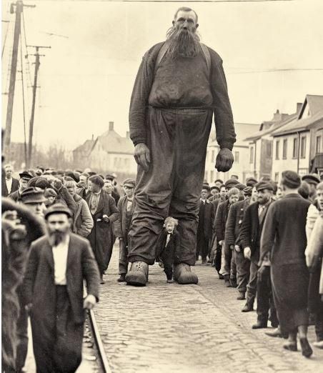 The last giant being paraded through the streets