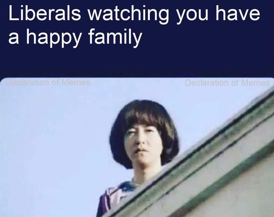 Happy family watching you go liberal