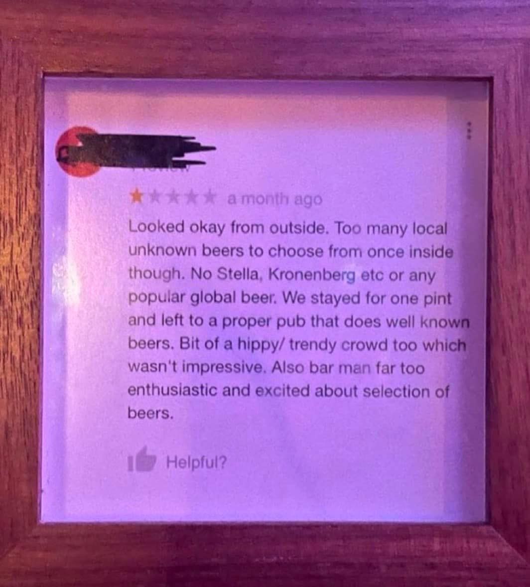 Review framed on local pub's wall lol